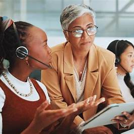 People reviewing information together in a supportive discussion